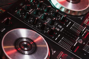 a close up of a dj's turntable and cd player